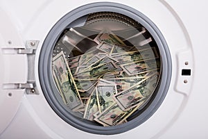 Pile Of Money In Washing Machine