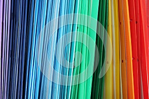 A pile of multicolored folders