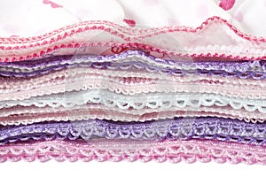 Pile of multicolored underwear clothes with lace