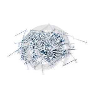 Pile of nails isolated over white background