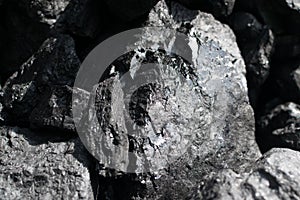 Pile of natural black hard coal or diamond coal background