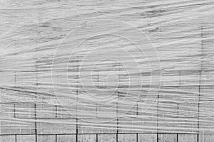A pile of new paving stone slabs wrapped in plastic wrap background. Building tile materials at the construction site
