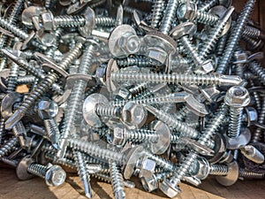 Pile of new screws - industrial