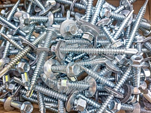 Pile of new screws - industrial