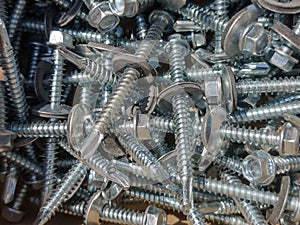 Pile of new screws - industrial