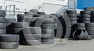 Pile of new tires. Many car and truck tyres in a pile