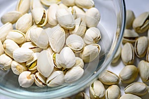 Pile nut of Pistachio or Pistacia vera in a bowl