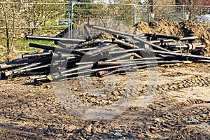 A pile of obsolete metal pipes dug out of the ground