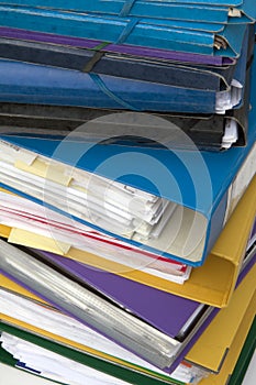 Pile of office binders in close up photo