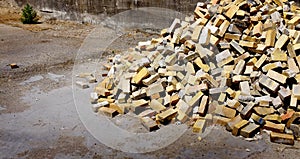 Pile of Old Bricks in Urban Setting Construction Building