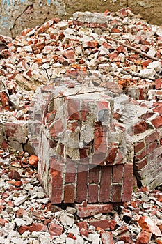 A pile of old broken red bricks