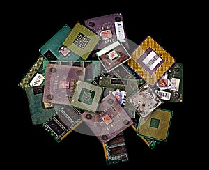 Pile of old burned CPU chips and memory modules