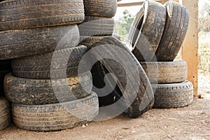 Pile of old car tires for rubber recycling.