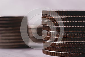 Pile of old metal coins and defocus background