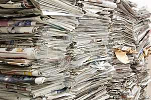 A pile of old newspapers photo