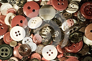 Pile of old retro buttons as a background