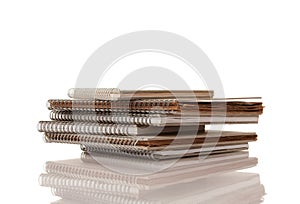 Pile of Old Spiral Note Pads