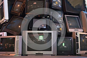 Pile of old televisions