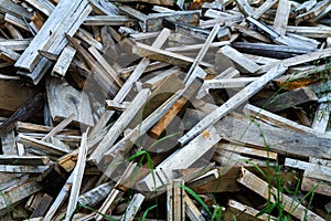 Pile of old timber wood on a backyard