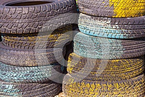 Pile of old tires and wheels for rubber