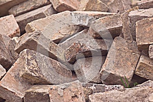 Pile of Old Used Bricks as Construction Material