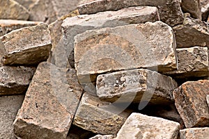 Pile of Old Used Bricks as Construction Material