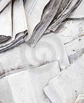 Old useless paper documents on the landfill photo