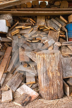 A pile of old wood chips, scrap wood, wooden blocks, old boards.