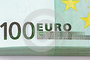 Pile of one hundred euro banknotes