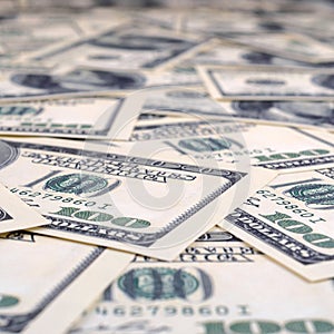Pile of one hundred US banknotes. Cash of hundred dollar bills