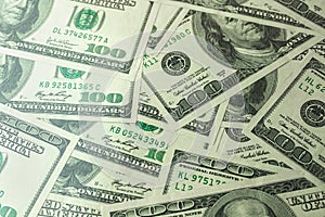 Pile of one hundred US banknotes, cash of hundred dollar bills, dollar background photo