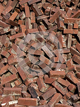 Pile of Orange bricks for road use