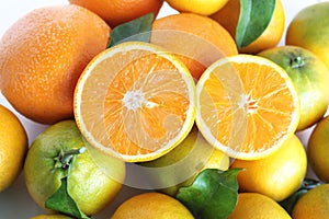 A pile of orange fruits on an isolated background.