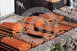 Pile of Orange Roofing Tiles