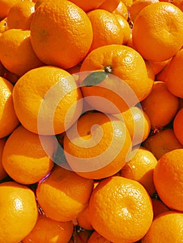Pile of oranges citrus fruit food fresh ripe juicy whole kinnow raw santra closeup naranja image laranja stock photo