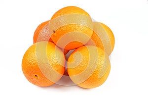 Pile of oranges isolated on white background. Delicious fruit