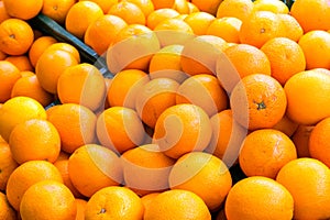 A pile of oranges for sale