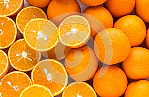 pile of oranges sliced and whole