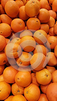 A pile of oranges in supermarket