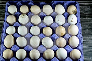 Pile of organic fresh and raw hen chicken eggs, stack of eggs isolated and ready to be cooked in various cuisines, selective focus