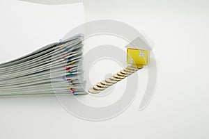 Pile overload paperwork with colorful paperclip