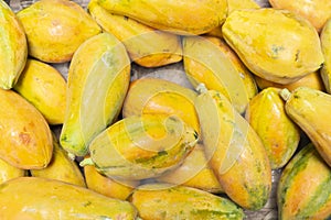 pile of papayas in the market