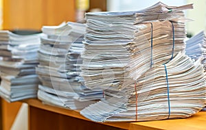 Pile of paper documents in the office