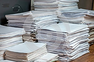 Pile of paper documents in the office, paper trash, waste paper