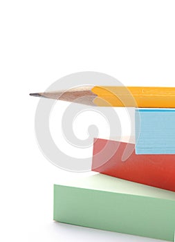 Pile of paper with a pencil
