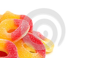 Peach Gummies on a White Background