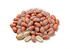 Pile of raw peanuts with one peanut shell isolated on white