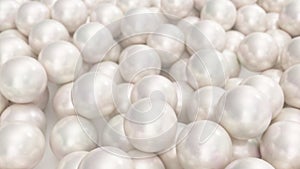 Pile of pearls. Background of the plurality of beautiful pearls. Gems, women`s jewelry, nacre beads. Background For your
