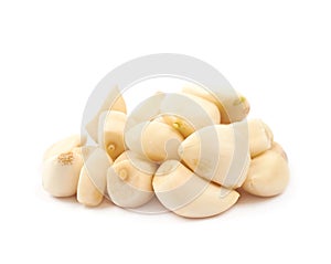 Pile of peeled garlic isolated