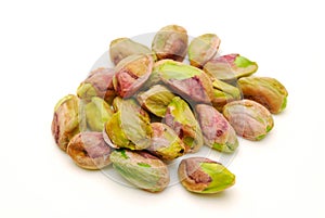 Pile of peeled pistachio nuts isolated